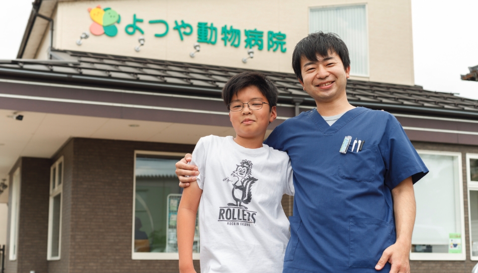 お子様と一緒に映る獣医師の和田 章秀 先生